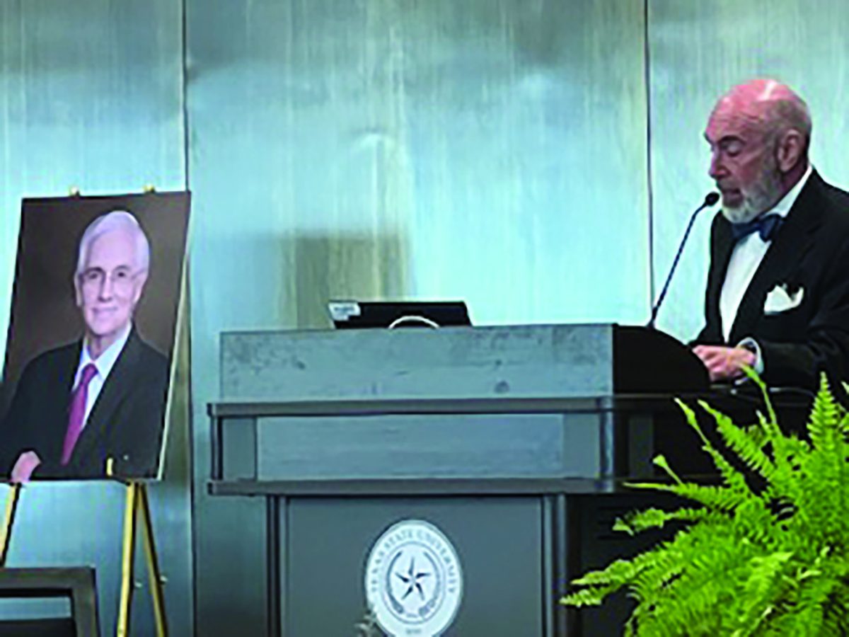 A man speaks at a podium, Monday, March 3, 2025 at JCK Ballroom. 