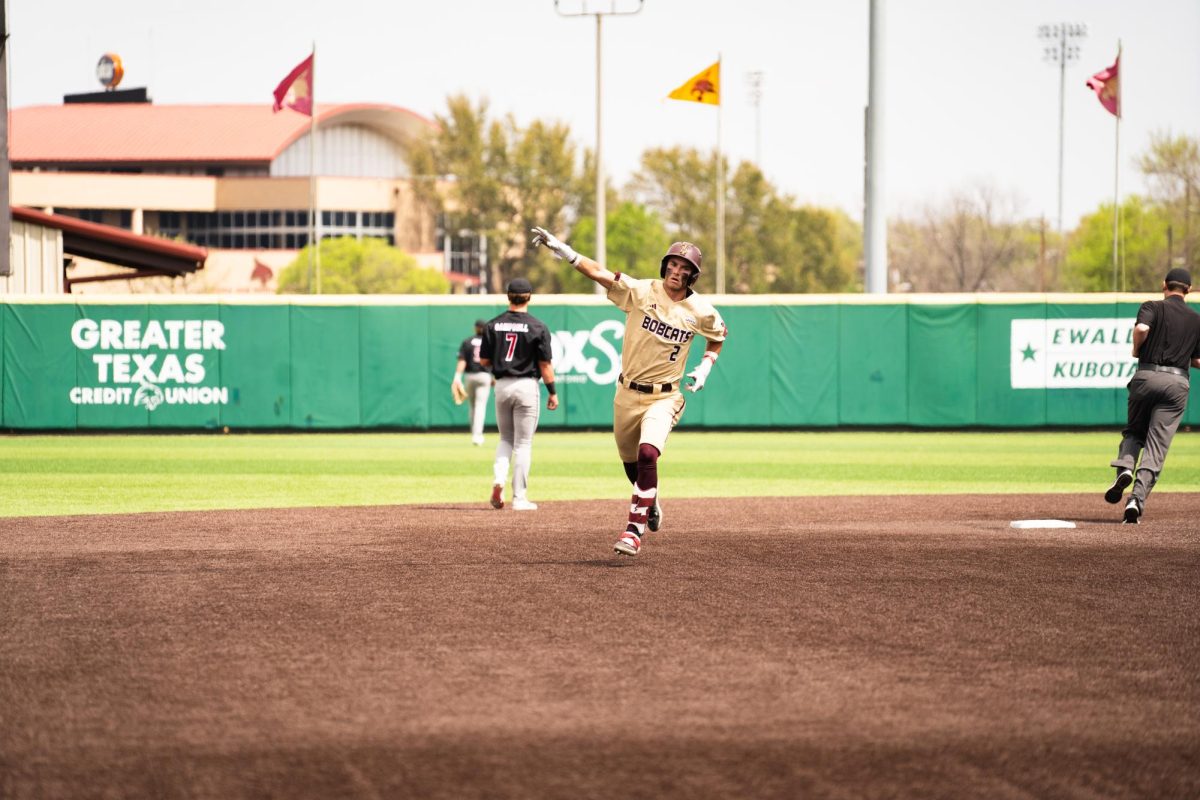 Texas State junior infielder Chase Mora (2) runs home after a home run against Arkansas State, Sunday, March 23, 2025, at Bobcat Ballpark.