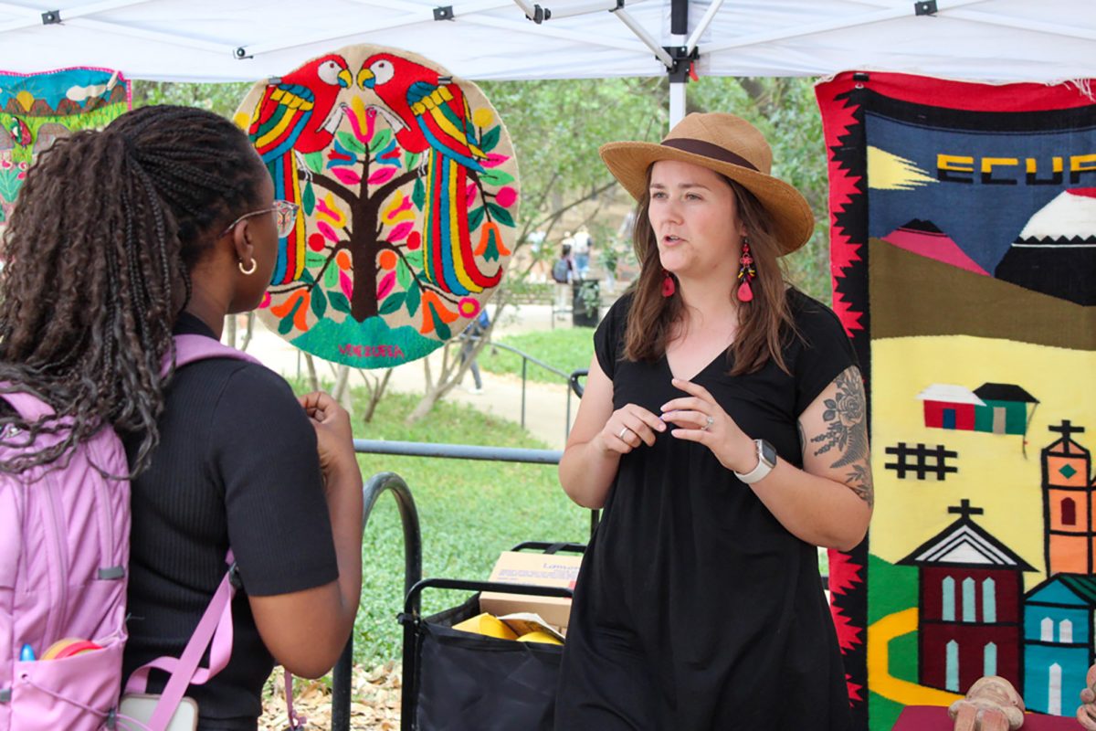 TXST Lecturer Olivia Vance answers students questions about the world languages and literatures department, Tuesday, April 15, 2025, during the Culture Expo at the Quad. The department offers several bachelors degrees with concentrations in Spanish.