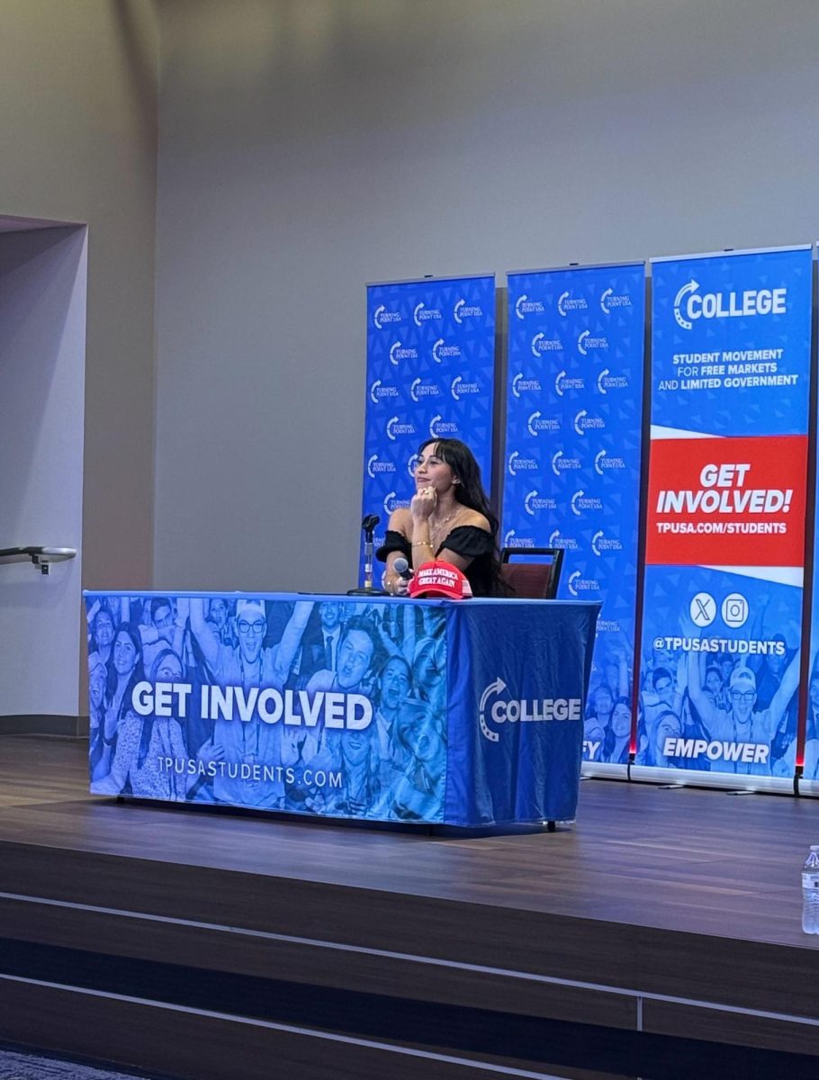  Chloe Cole listens to a speaker during a Turning Point USA event, Wednesday, Sept. 24, 2025 at the LBJ Grand Ballroom.