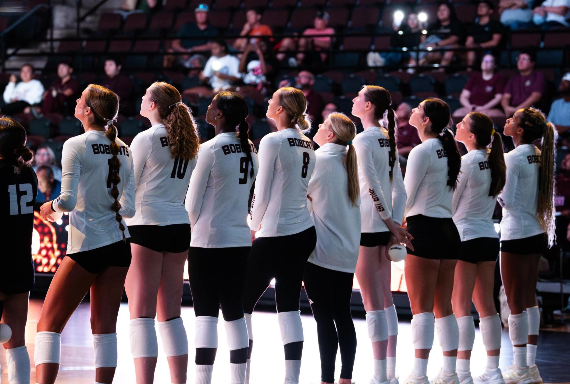 Texas State volleyball team lines up for player announcements before the game, Thursday, September 11, 2025, at Strahan Arena. Arizona State won 3-2 sets.