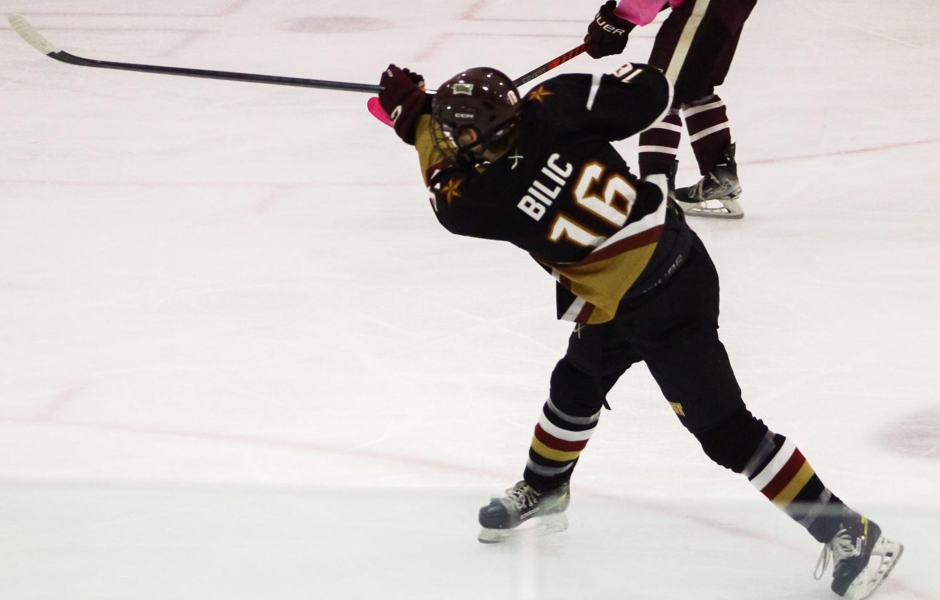 Texas State senior forward Leo Bilic  (16) hits a slapshot against Texas A&M, Friday, Oct. 24 at Spirit Ice Arena in 
College Station Texas 
State lost 4-0.