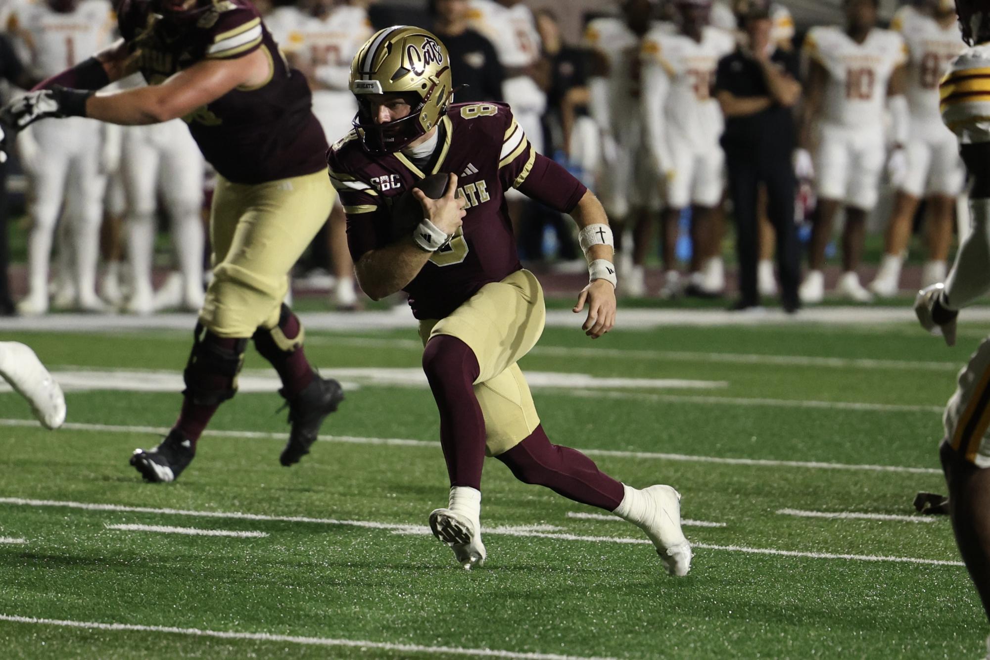 Texas State freshman quarterback Brad Jackson (8) runs towards the endzone against Louisiana-Monroe, Saturday, Nov. 22, 2025, at UFCU Stadium. The Bobcats won 31-14.