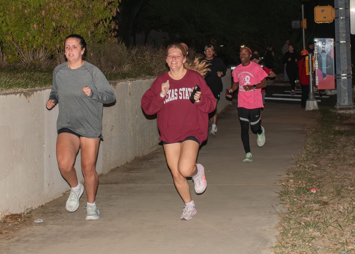 The Texas Health & Racquet Club run club start it's run, Tuesday, Nov. 11, 2025, at Zelicks Icehouse. The running trail takes the club through 2 miles of Downtown San Marcos neighborhoods.