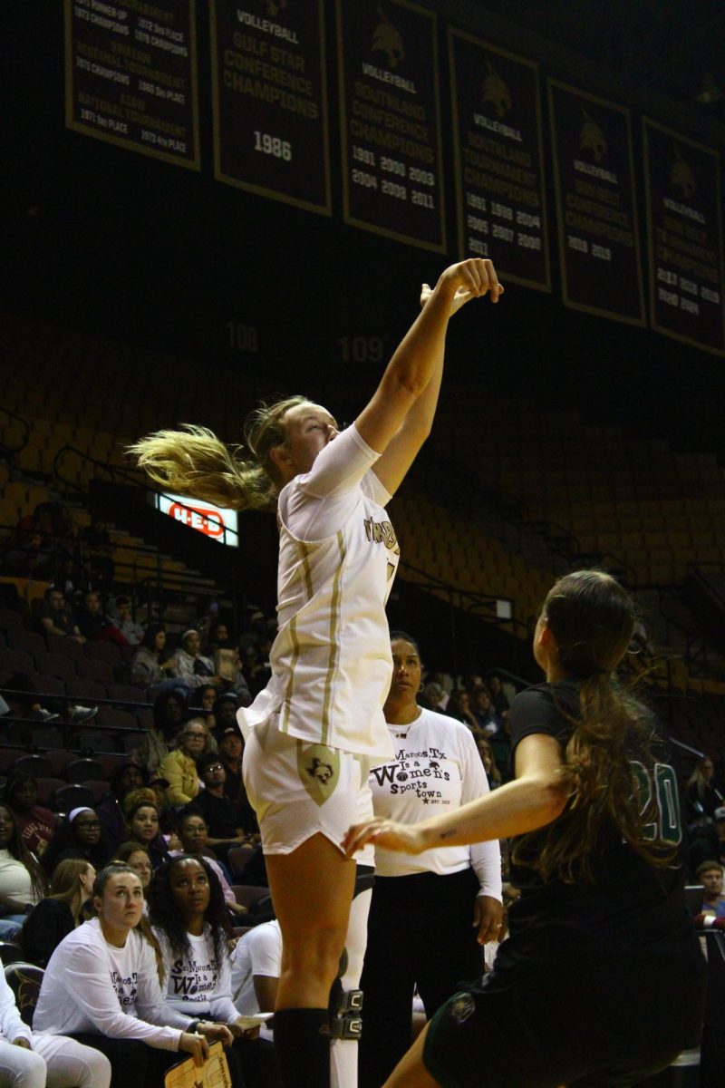 Texas state sophomore guard Mia Galbraith (11) shoots a jump shot, Monday, Nov. 3, 2025, at Strahan Arena. Texas State lost to Ohio 72-66.