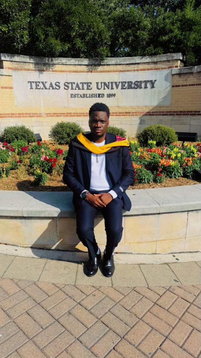 Ayodeji Akinloye poses during his graduation after completing his master's degree, Saturday, Dec. 13, 2025, at Texas State University. Photo courtesy of Daniel Jonathan.