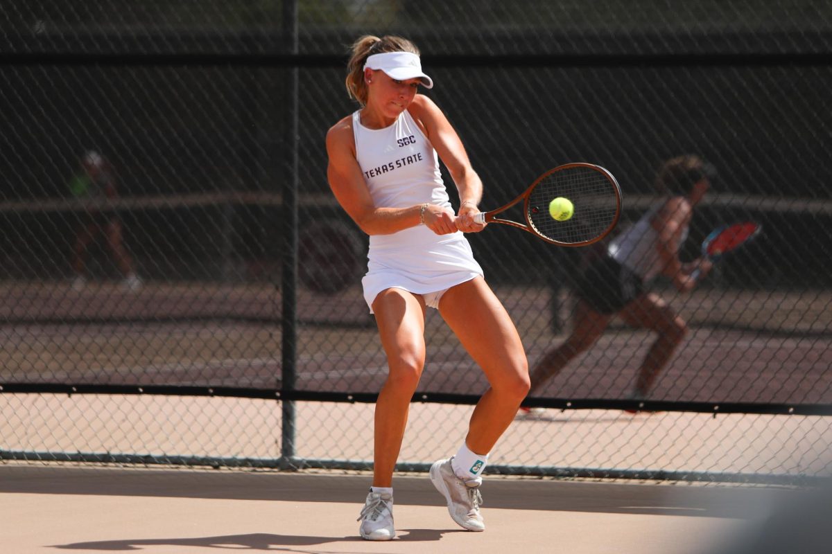 Texas State senior Emily Niers returns the ball at the River State Shoot out, Sunday, Oct. 5, 2025 at Bobcat Tennis Complex. 