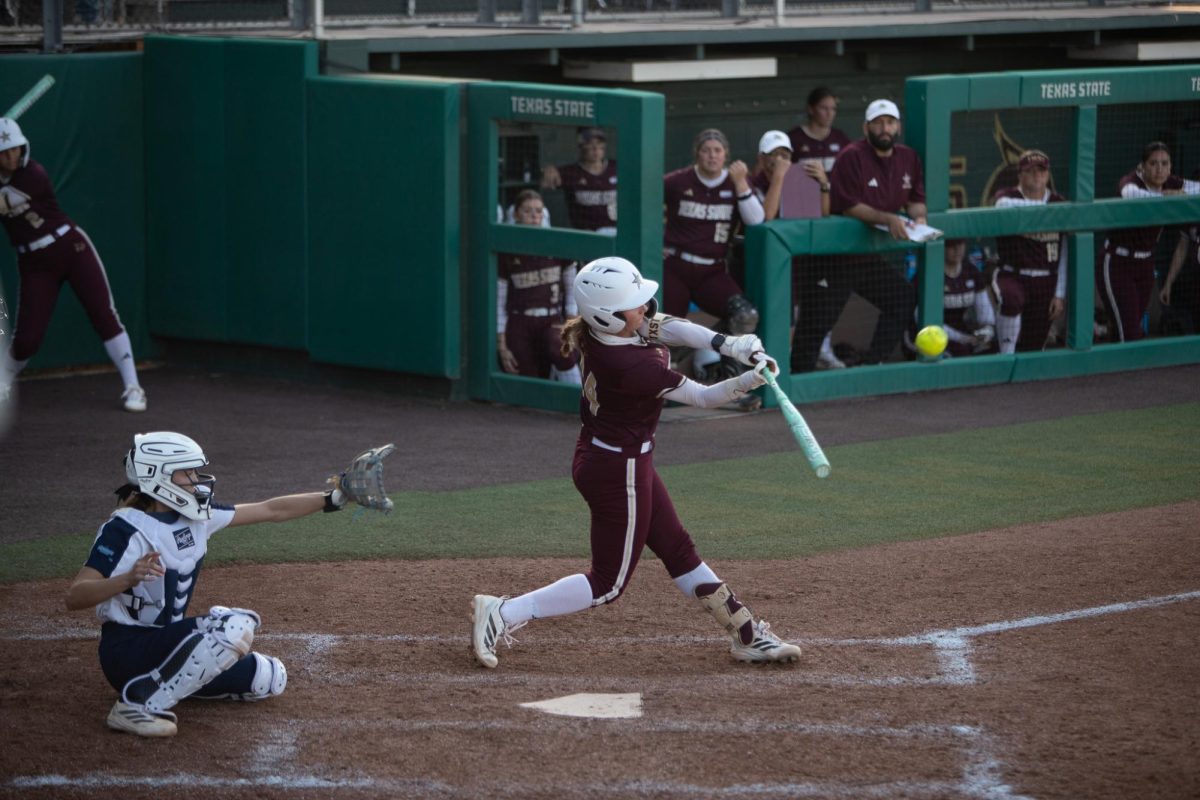 Texas State junior infielder Kate Bubela (24) swings the bat, Thursday, Feb 19, 2026, at Bobcat Softball Stadium. Texas State beat Kansas City 7-6.
