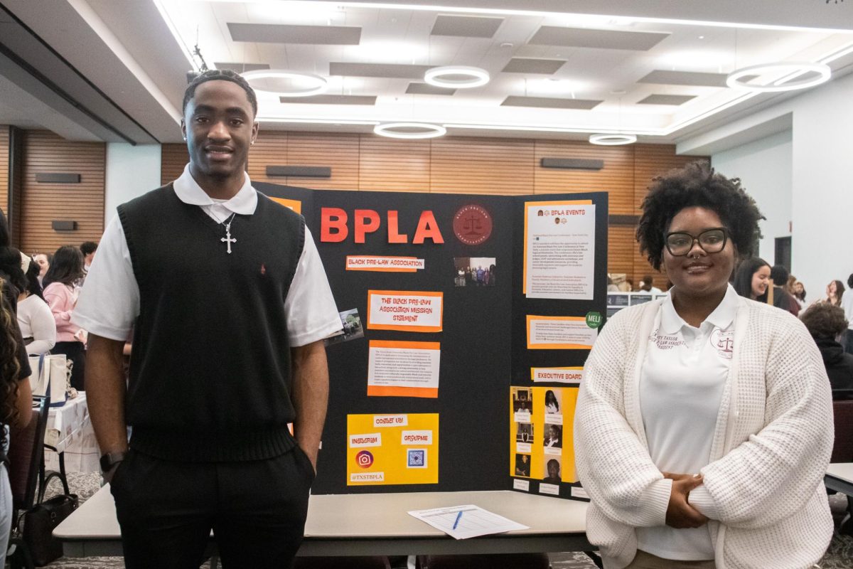 Black Pre-Law Association Outreach Coordinator Jordan Nnadozie (left) and President Trinity Taylor (right) present information about Texas State’s Black Pre-Law Association with students at the Student Involvement Fair, Thursday, Jan. 29, 2026, at LBJ Student Center.