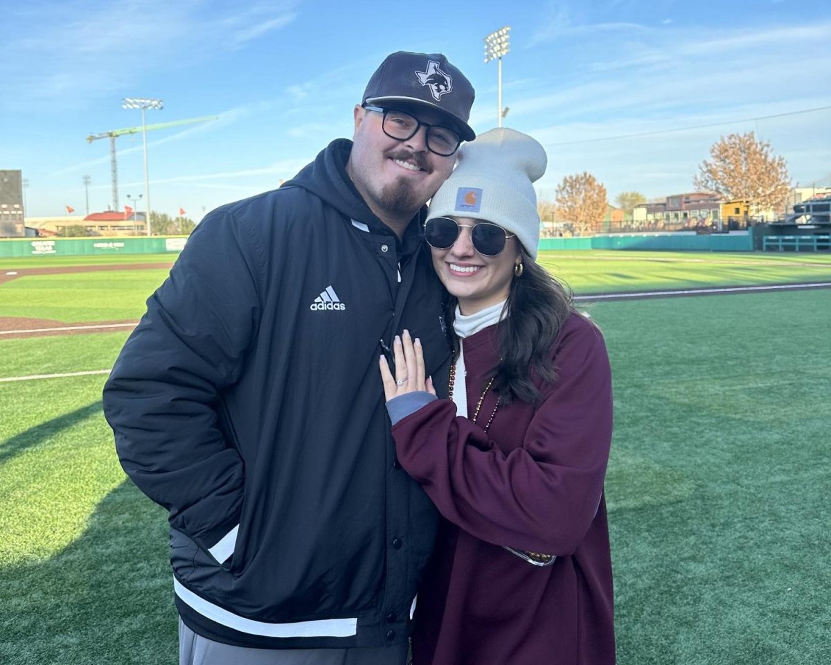 Joseph and Claudia Hill pose for a photo after a Texas State baseball game on Feb. 17th, 2024.