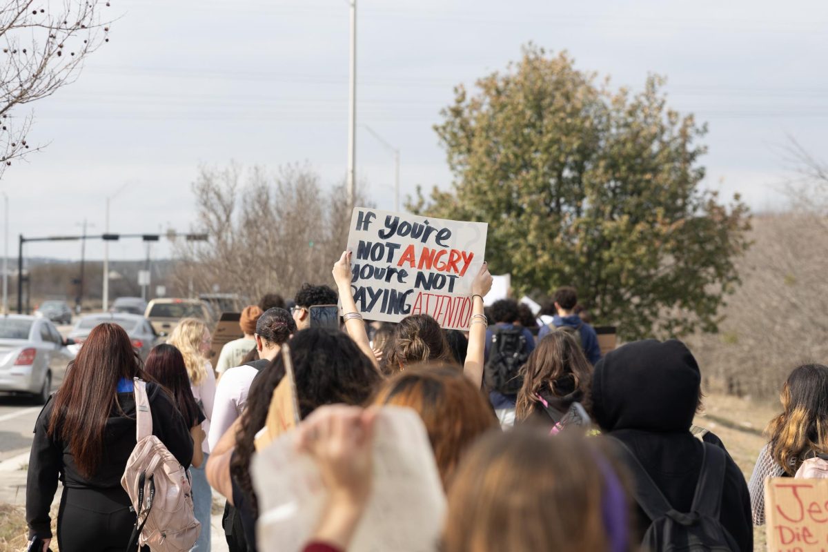 SMHS students walk along Rattler Road on Tuesday, Feb. 3, 2026. The walkout was staged to protest Immigration and Customs Enforcement.