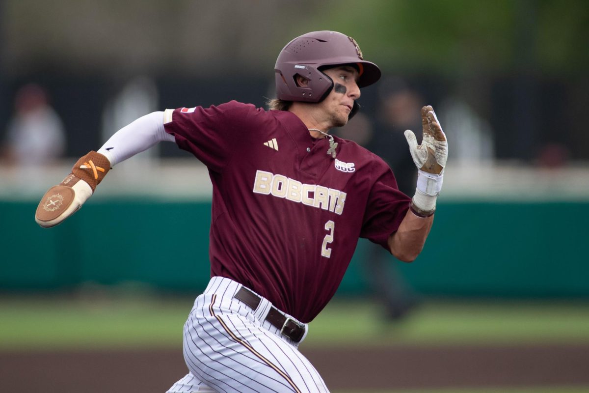 Texas State senior third baseman Chase Mora (2) runs to third base, Sunday, March 8, 2026, at Bobcat Ballpark. The Bobcats won 4-3.
