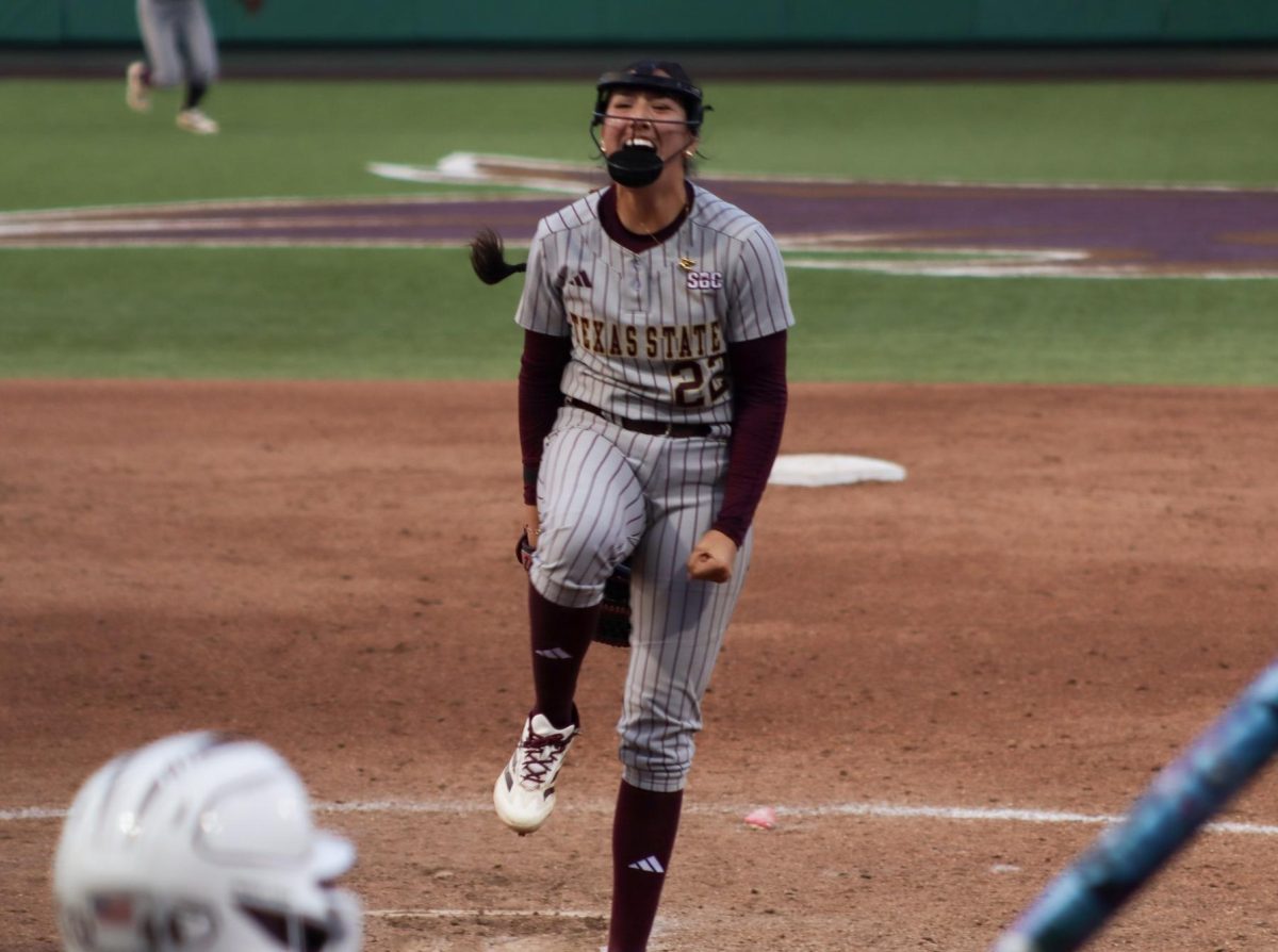 Texas State junior pitcher Madison Azua (22) celebrates after the final strikeout of the game, Friday, March 6, 2026, at Bobcat Softball Stadium. The Bobcats beat No.15 Texas A&M 3-1.