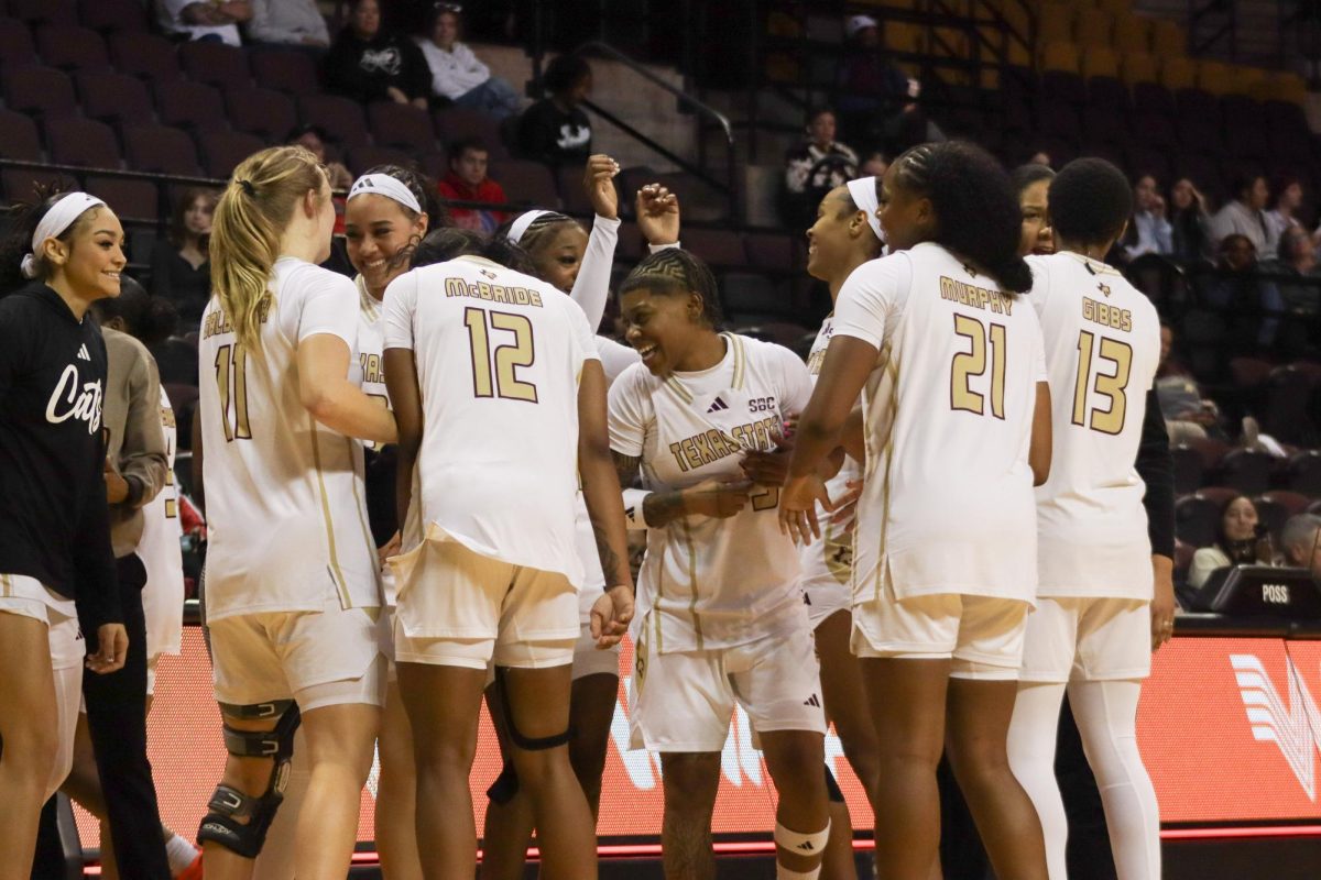The Texas State women's basketball team celebrates during the game, Wednesday, Dec. 10, 2025, at Strahan Arena. The Bobcats beat UNT Dallas 64-38.