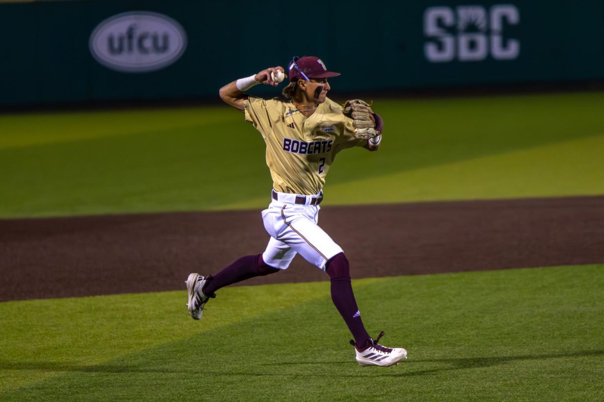 Texas State senior third basemen Chase Mora (2) makes a throw across the infield against UTSA, Tuesday, Feb. 24, 2026, at Bobcat Ballpark. The Bobcats won 7-2.