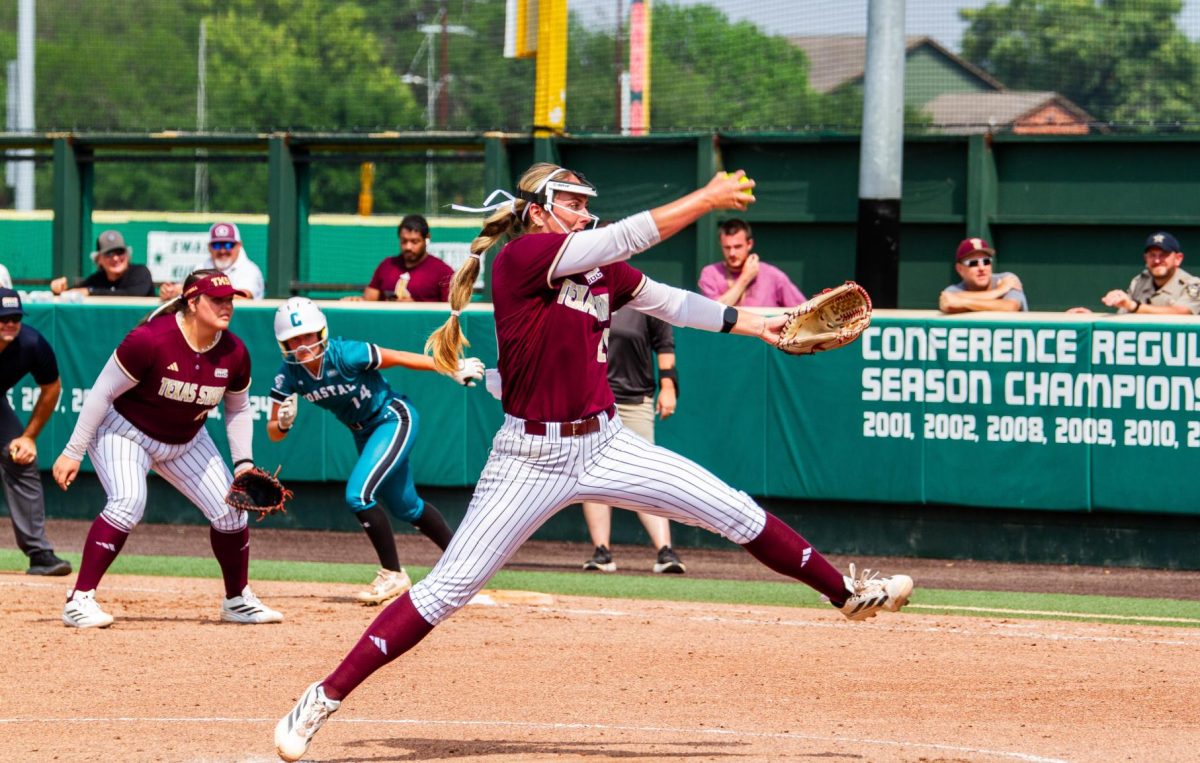 Texas State senior pitcher Emma Strood winds up to pitch, Saturday, April 25, 2026 at Bobcat Softball Stadium. Texas State beat Coastal Carolina 5-0.