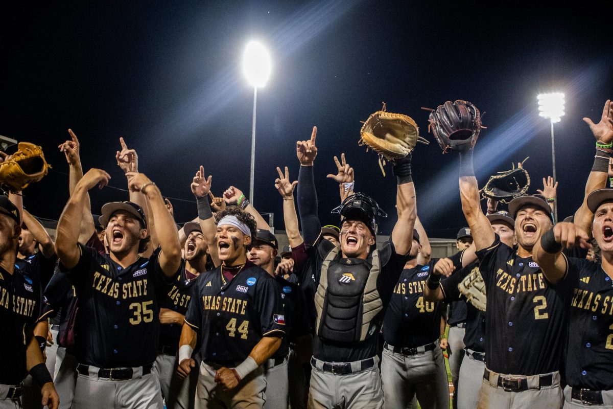 Texas State players celebrate after a victory against No. 25 USC at the College Station Regional Playoff, May 29, 2026, at Blue Bell Park in College Station, Texas. The Bobcats upset the Trojans 5-4.