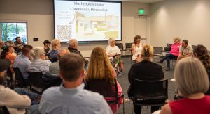 Community members and city staff discuss plans for a city hall facility, Thursday, June 11, 2026, at the San Marcos Public Library.
