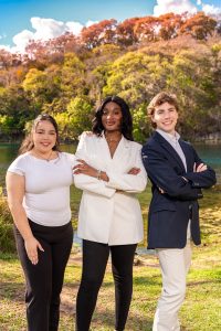 Anaysa Guerra (left), Johanna Ajayi (center) and Keller Hammack (right) standing at the Meadows Center, Wednesday, March 11, on 211 San Marcos Springs Dr. Photo courtesy of Jesse Ijemeh.